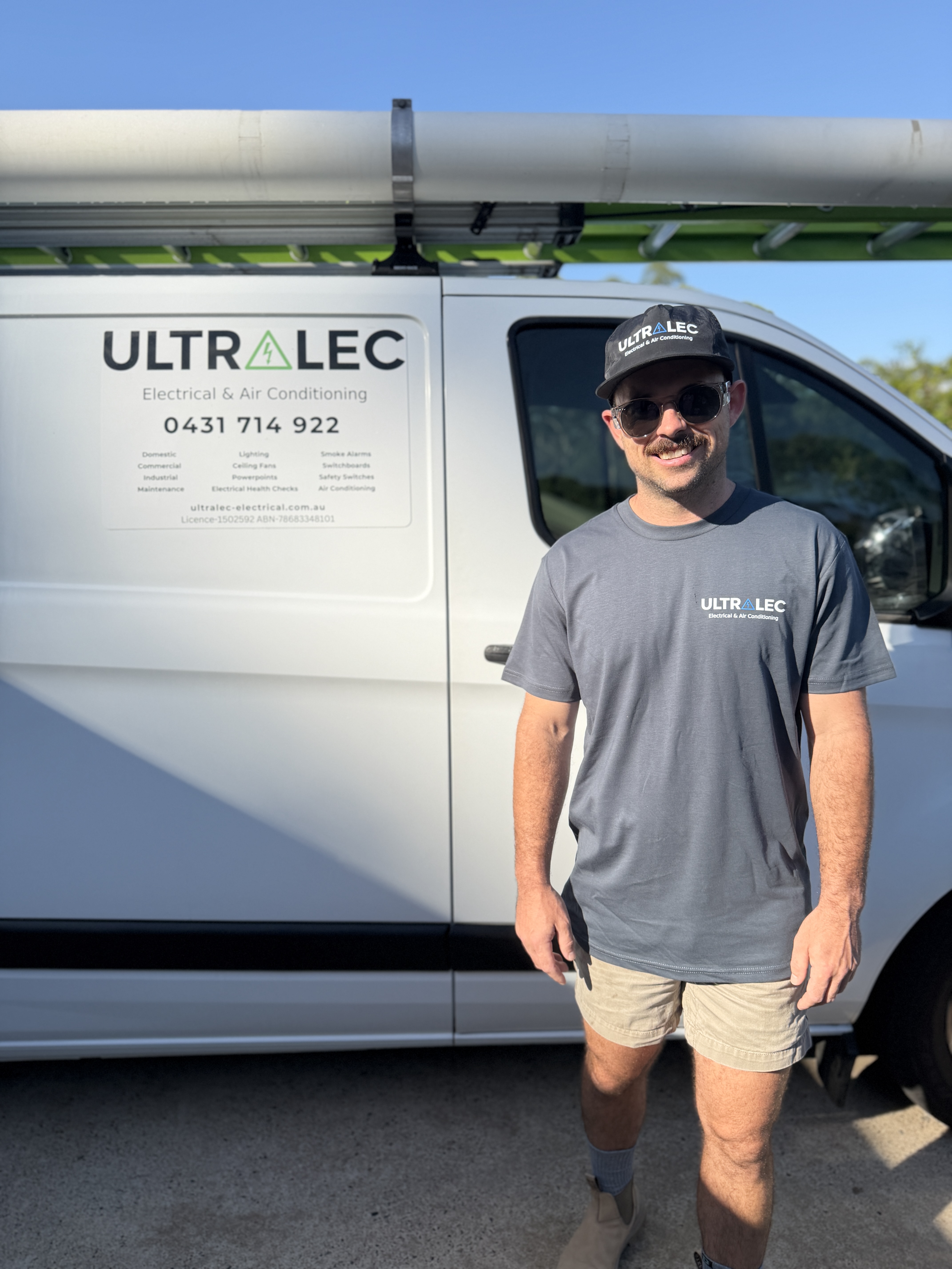 Alex from Ultralec Electrical standing in front of his van in Pomona, Queensland